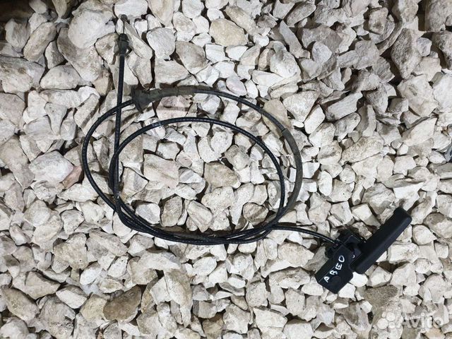 Трос капота Шевроле Авео Т300