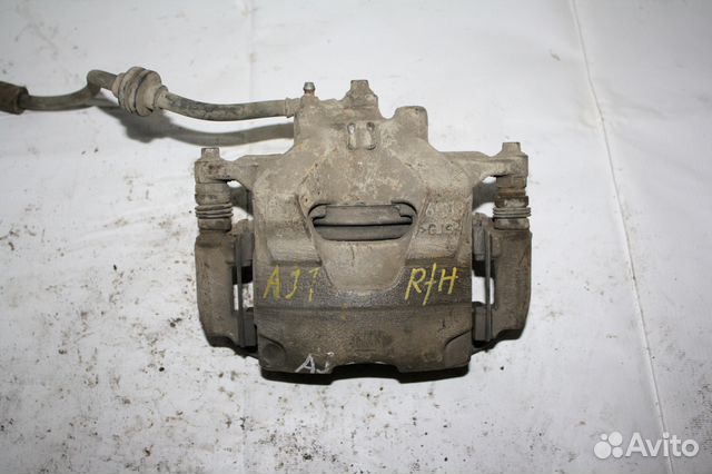 Суппорт передний правый Opel Astra J 13301227