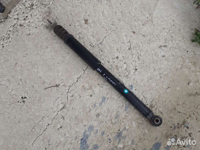 Стойка амортизатора задний Renault Sandero 2