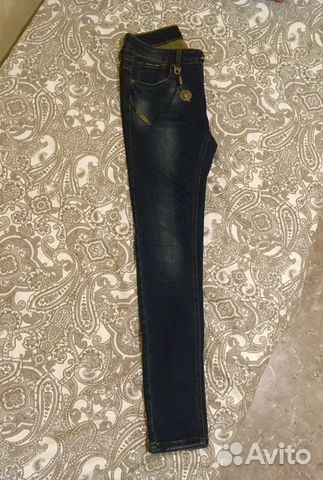 Новые темно-синие джинсы