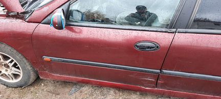 Дверь передняя левая Renault laguna 1