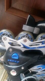 Роликовые коньки