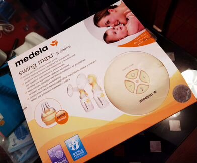 Молокоотсос medela swing maxi