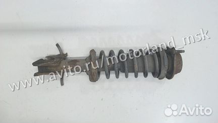 Амортизатор подвески левый передний Mazda Demio, 2