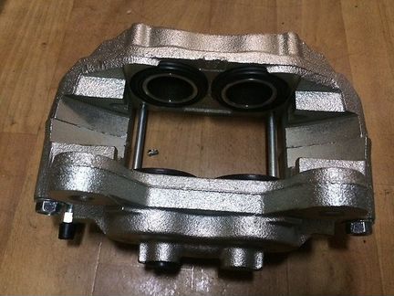 Суппорт тормозной перед T Land Cruiser 80